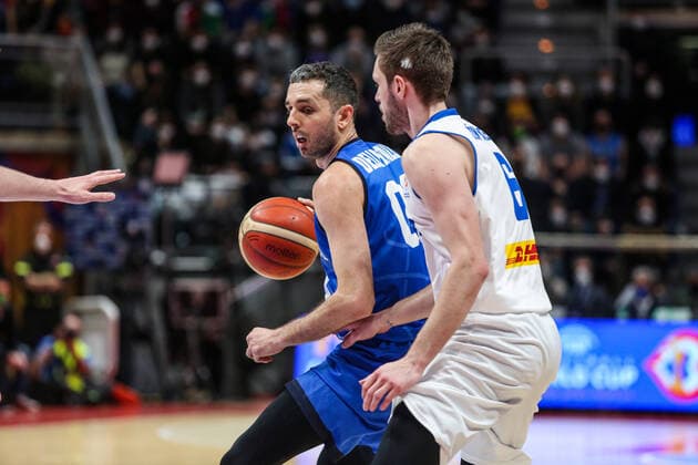 February 27, 2022, Bologna, Italy: Bologna, Italy, PalaDozza, February 27, 2022, Amedeo Della Valle (ITALY) and Jon Axel Gudmundsson (ICELAND) in action during FIBA World Cup Qualifiers - Italy vs Iceland - Iternational Basketball Teams. Iternational Basketball Teams - FIBA World Cup Qualifiers - Italy vs Iceland, Bologna, Italy - ZUMAl164 20220227_zsa_l164_543 Copyright: xDavidexDixLallax
