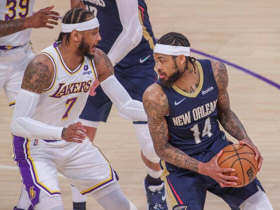Brandon Ingram 14 of the New Orleans Pelicans is guarded by Carmelo Anthony 7 of the LA Lakers, during an NBA, Basketball Herren, USA game between Los Angeles Lakers and New Orleans Pelicans, at Crypto.com Arena in Los Angeles, United States, 27 February 2022. Los Angeles Lakers vs New Orleans Pelicans !ACHTUNG: NUR REDAKTIONELLE NUTZUNG!  Copyright: xPHILLIPxKIMx AME9165 20220228-7c2b81ec62b5ce604eace6eedb562c75720fa073