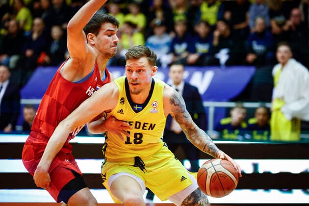 Croatia s Filip Kruslin and Sweden s Viktor Gaddefors (R) during the FIBA Basketball World Cup 2023 European qualifier (group C) between Sweden and Croatia at Stadium Arena in Norrkoping, Sweden, on Feb. 28, 2022. NORRKOPING SWEDEN x60160x