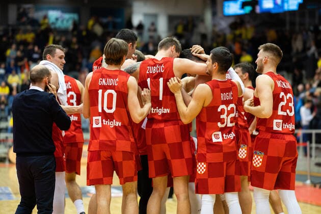 220228 Players of Croatia celebrate after the FIBA World Cup Qualifier game between Sweden and Croatia on February 28, 2022 in Norrköping. Copyright: PETERxHOLGERSSON BB220228PH055