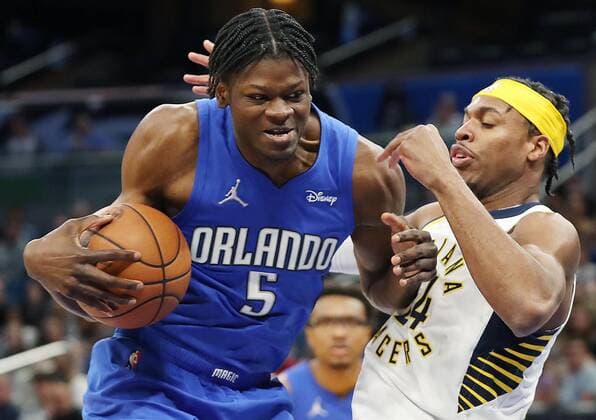 March 2, 2022, Orlando, Florida, USA: Orlando Magic center Mo Bamba (5) fights past Indiana Pacers forward Buddy Hield (24) at the Amway Center on Wednesday, March 2, 2022, in Orlando, Florida. Orlando USA - ZUMAm67_ 0152558631st Copyright: xStephenxM.xDowellx