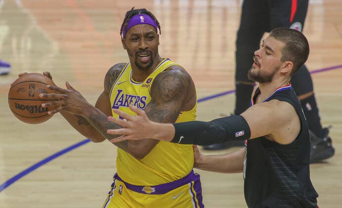 Ivica Zubac (R) of the Clippers disputes the ball with Dwight Howard of the Lakers, during the NBA, Basketball Herren, USA game between Los Angeles Clippers and Los Angeles Lakers, at Crypto.com Arena in Los Angeles, California, USA, 03 March 2022. Los Angeles Clippers vs Los Angeles Lakers !ACHTUNG: NUR REDAKTIONELLE NUTZUNG!  Copyright: xPHILLIPxKIMx AME305 20220304-7e39046c2fc190a9bc028153d557ab4885ae8ef3