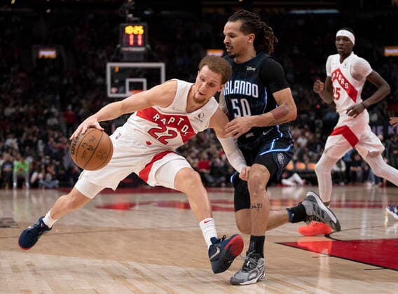 March 4, 2022, Toronto, on, Canada: Toronto Raptors guard Malachi Flynn (22) runs into stiff defence from Orlando Magic guard Cole Anthony (50) during second half NBA, Basketball Herren, USA action in Toronto on Friday March 4, 2022. Canada News - March 4, 2022  - ZUMAc35_ 20220304_zaf_c35_070 Copyright: xFrankxGunnx