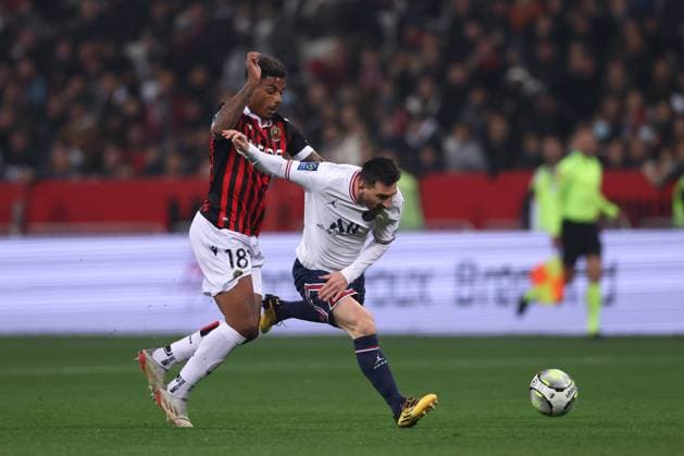 Nice, France, 5th March 2022. Mario Lemina of OGC Nice challenges Lionel Messi of PSG during the Uber Eats Ligue 1 match at Allianz Riviera Stadium, Nice. Picture credit should read: Jonathan Moscrop Sportimage EDITORIAL USE ONLY. No use with unauthorised audio, video, data, fixture lists, club league logos or live services. Online in-match use limited to 120 images, no video emulation. No use in betting, games or single club league player publications. SPI-1565-0004