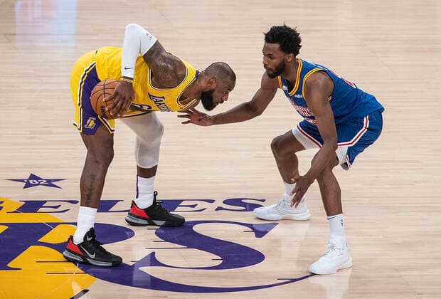 March 5, 2022, Los Angeles, California, USA: LeBron James 6 of the Los Angeles Lakers is defended by Andrew Wiggins 22 of the Golden State Warriors during their NBA, Basketball Herren, USA game on Saturday March 5, 2022 at Crypto.com Arena in Los Angeles, California. Lakers defeat Warriors, 124-116. PI Los Angeles USA - ZUMAp124 20220305_zaa_p124_051 Copyright: xJAVIERxROJASx
