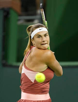 March 08, 2022 Aryna Sabalenka of Belarus returns a shot against Simona Halep of Romania during the Eisenhower Cup of the 2022 BNP Paribas Open at Indian Wells Tennis Garden in Indian Wells, California. Mandatory Photo Credit : CSM. Indian Wells United States of America - ZUMAc04_ 20220308_zaf_c04_175 Copyright: xCharlesxBausx
