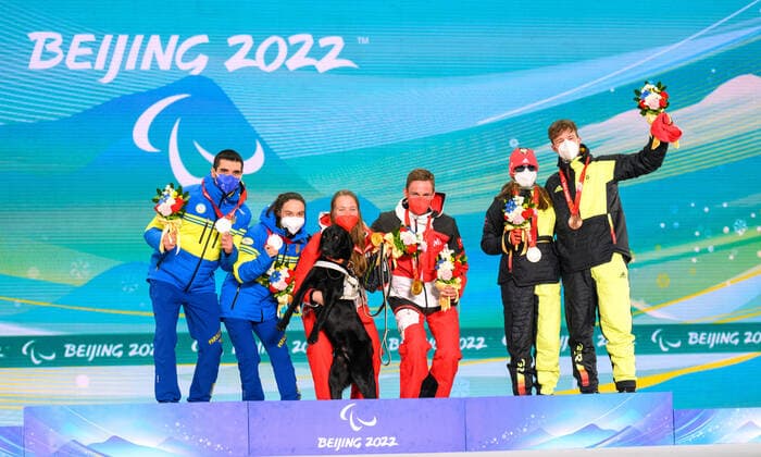 Paralympic Games Beijing 2022 09.3.2022 Day (5) ZHANGIJAKOU, PEOPLES REPUBLIC OF CHINA - MARCH 09: Image of the Paralympic Games Beijing 2022 during the medal ceremonies at Zhangijakou Medals Plaza of Zhangijakou on 20.8.2021 in Hebei Peoples Republic of China. KAZMAIER, Linn (GER), local club: SZ Roemerstein (WUER), date of birth: 05.11.2006 place of birth: Nuertingen, paralympic classification: B3 and her guide BAUMANN, Florian (GER) on the podest for their bronce medal. Silver goes to Ukraine (SHYSHKOVA Oksana and her guide MARCHENKO Andriy). Gold goes to Austria (EDLINGER Carina and her guide LAMPL Lorenz Josef) Oliver Kremer DBS Copyright: xBEAUTIFULxSPORTS OliverxKremerx