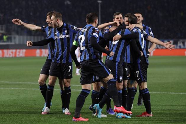 Bergamo, Italy, 10th March 2022. Luis Muriel of Atalanta celebrates with team mates after scoring to give the side a 3-1 lead during the UEFA Europa League match at Gewiss Stadium, Bergamo. Picture credit should read: Jonathan Moscrop Sportimage EDITORIAL USE ONLY. No use with unauthorised audio, video, data, fixture lists, club league logos or live services. Online in-match use limited to 120 images, no video emulation. No use in betting, games or single club league player publications. SPI-1574-0059