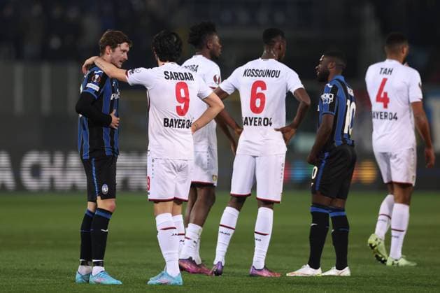 Bergamo, Italy, 10th March 2022. Aleksej Miranchuk of Atalanta and Sardar Azmoun of Bayer Leverkusen discuss following the final whistle of the UEFA Europa League match at Gewiss Stadium, Bergamo. Picture credit should read: Jonathan Moscrop Sportimage EDITORIAL USE ONLY. No use with unauthorised audio, video, data, fixture lists, club league logos or live services. Online in-match use limited to 120 images, no video emulation. No use in betting, games or single club league player publications. SPI-1574-0063