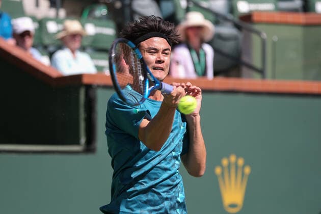 INDIAN WELLS, CA - MARCH 11: Taro Daniel (JPN) hits a forehand during the BNP Paribas Open on March 11, 2022 at Indian Wells Tennis Garden in Indian Wells, CA. (Photo by George Walker Icon Sportswire) TENNIS: MAR 11 BNP Paribas Open Icon220311013