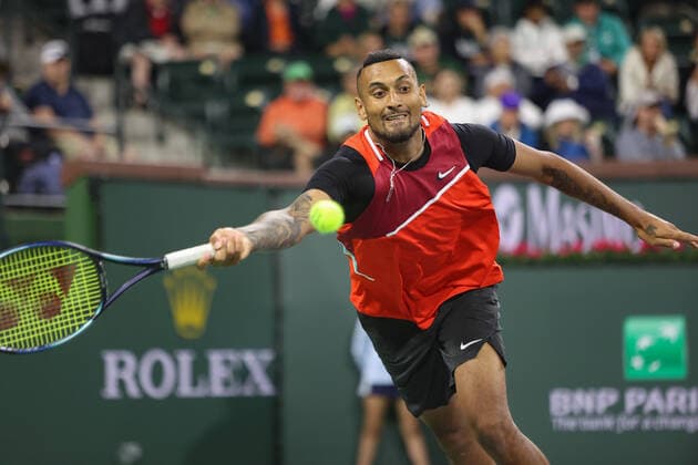 INDIAN WELLS, CA - MARCH 11: Nick Kyrgios (AUS) stretches for a forehand during the BNP Paribas Open on March 11, 2022 at Indian Wells Tennis Garden in Indian Wells, CA. (Photo by George Walker Icon Sportswire) TENNIS: MAR 11 BNP Paribas Open Icon220311071