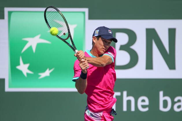INDIAN WELLS, CA - MARCH 12: Mackenzie McDonald (USA) hits a backhand during the BNP Paribas Open on March 12, 2022 at Indian Wells Tennis Garden in Indian Wells, CA. (Photo by George Walker Icon Sportswire) TENNIS: MAR 12 BNP Paribas Open Icon220312007