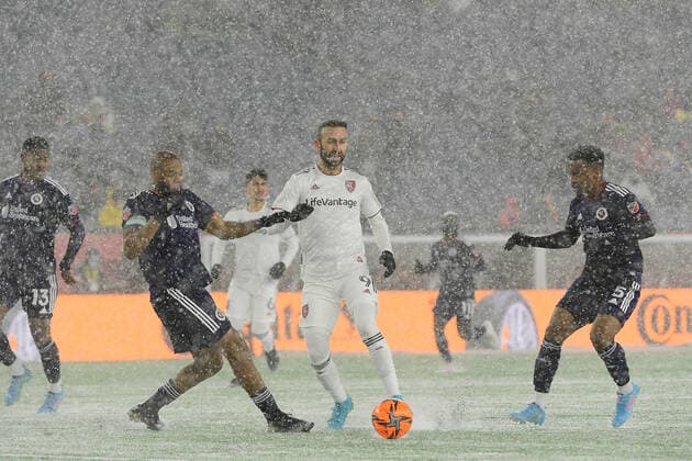 March 12, 2022: New England Revolution defender Andrew Farrell (2) (left) plays the ball away from Real Salt Lake forward Justin Meram (9) during the MLS, Fussball Herren, USA match between Real Salt Lake and the New England Revolution held at Gillette Stadium in Foxborough Massachusetts. CSM Foxborough USA - ZUMAc04_ 20220312_zaf_c04_174 Copyright: xEricxCanhax