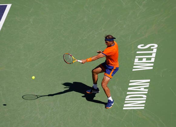 March 12, 2022 Rafael Nadal of Spain returns a shot against Sebastian Korda during the 2022 BNP Paribas Open at Indian Wells Tennis Garden in Indian Wells, California. Mandatory Photo Credit: CSM. Indian Wells United States of America - ZUMAc04_ 20220312_zaf_c04_189 Copyright: xCharlesxBausx