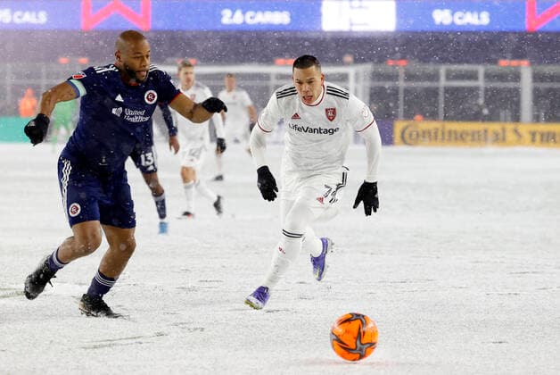 FOXBOROUGH, MA - MARCH 12: New England Revolution defender Andrew Farrell (2) and Real Salt Lake forward Bobby Wood (7) chase the ball during a match between the New England Revolution and Real Salt Lake on March 12, 2022, at Gillette Stadium in Foxborough, Massachusetts. (Photo by Fred Kfoury III Icon Sportswire) SOCCER: MAR 12 MLS, Fussball Herren, USA - Real Salt Lake at New England Revolution Icon482220312001