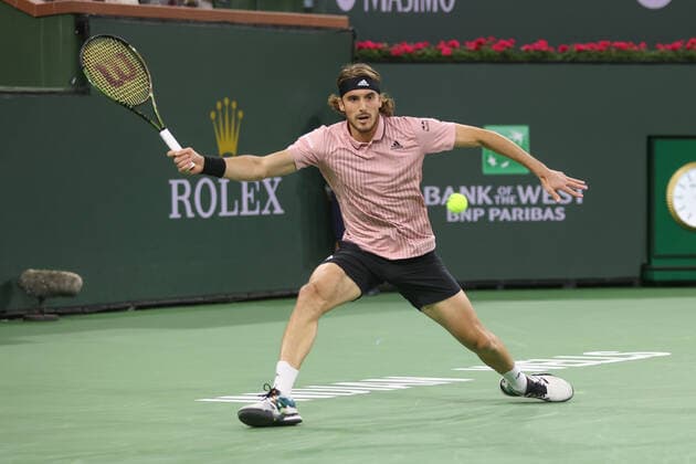 INDIAN WELLS, CA - MARCH 12: Stefanos Tsitsipas (GRE) hits a forehand during the BNP Paribas Open on March 12, 2022 at Indian Wells Tennis Garden in Indian Wells, CA. (Photo by George Walker Icon Sportswire) TENNIS: MAR 12 BNP Paribas Open Icon220312049