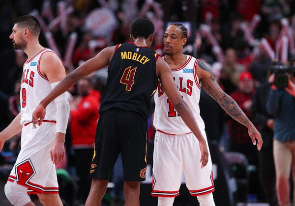 CHICAGO, IL - MARCH 12: Cleveland Cavaliers center Evan Mobley (4) and Chicago Bulls forward DeMar DeRozan (11) greet one another after a NBA, Basketball Herren, USA game between the Cleveland Cavaliers and the Chicago Bulls on March 12, 2022 at the United Center in Chicago, IL. (Photo by Melissa Tamez Icon Sportswire) NBA: MAR 12 Cavaliers at Bulls Icon22031248
