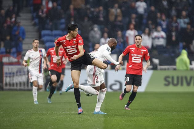 Nayef Aguerd (Rennes) vs Moussa Dembele (Olympique Lyonnais) FOOTBALL : Olympique Lyonnais vs Stade Rennais - Ligue 1 Uberteat - 13 03 2022 AurelienMorissard Panoramic 
