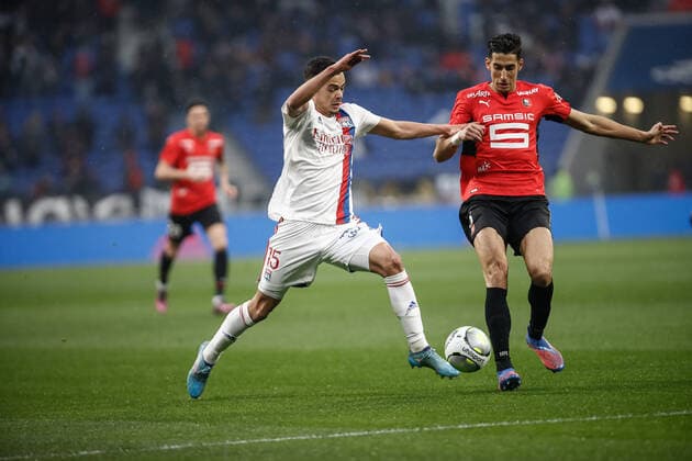 Romain Faivre (Olympique Lyonnais) vs Nayef Aguerd (Rennes) FOOTBALL : Olympique Lyonnais vs Stade Rennais - Ligue 1 Uberteat - 13 03 2022 AurelienMorissard Panoramic 