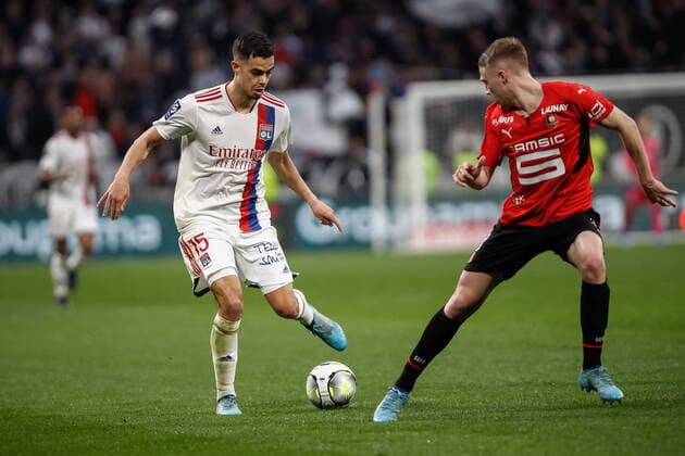 Romain Faivre (Olympique Lyonnais) vs Adrien Truffert (Rennes) FOOTBALL : Olympique Lyonnais vs Stade Rennais - Ligue 1 Uberteat - 13 03 2022 AurelienMorissard Panoramic 