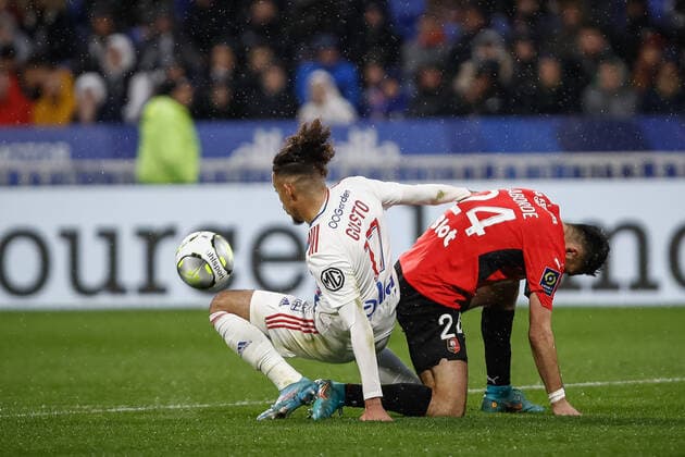 Malo Gusto (Olympique Lyonnais) vs Gaetan Laborde (Rennes) FOOTBALL : Olympique Lyonnais vs Stade Rennais - Ligue 1 Uberteat - 13 03 2022 AurelienMorissard Panoramic 