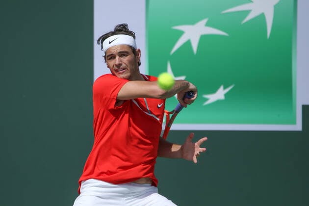 INDIAN WELLS, CA - MARCH 13: Taylor Fritz (USA) hits a forehand during the BNP Paribas Open on March 13, 2022 at Indian Wells Tennis Garden in Indian Wells, CA. (Photo by George Walker Icon Sportswire) TENNIS: MAR 13 BNP Paribas Open Icon220313034