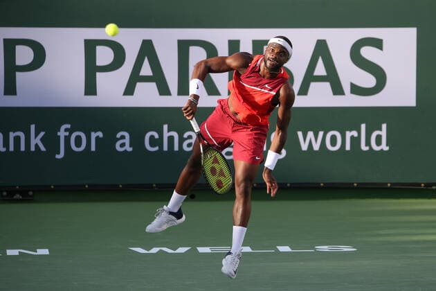INDIAN WELLS, CA - MARCH 13: Frances Tiafoe (USA) serves during the BNP Paribas Open on March 13, 2022 at Indian Wells Tennis Garden in Indian Wells, CA. (Photo by George Walker Icon Sportswire) TENNIS: MAR 13 BNP Paribas Open Icon220313070