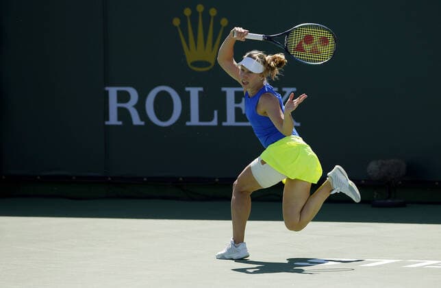 Mandatory Credit: Photo by Ella Ling Shutterstock (12845056m) Daria Saville of Australia in action wearing the Ukraine colours BNP Paribas Open, Tennis, Day 6, Indian Wells Tennis Garden, California, USA - 14 Mar 2022 BNP Paribas Open, Tennis, Day 6, Indian Wells Tennis Garden, California, USA - 14 Mar 2022 Copyright: xEllaxLing Shutterstockx 12845056m