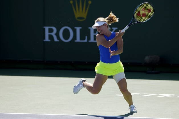 Mandatory Credit: Photo by Ella Ling Shutterstock (12845056n) Daria Saville of Australia in action wearing the Ukraine colours BNP Paribas Open, Tennis, Day 6, Indian Wells Tennis Garden, California, USA - 14 Mar 2022 BNP Paribas Open, Tennis, Day 6, Indian Wells Tennis Garden, California, USA - 14 Mar 2022 Copyright: xEllaxLing Shutterstockx 12845056n