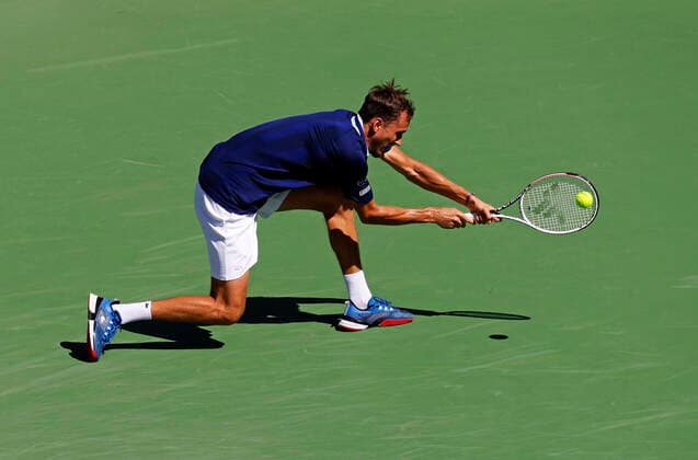 March 14, 2022 Daniil Medvedev of Russia returns a shot against Gael Monfils of France during the 2022 BNP Paribas Open at Indian Wells Tennis Garden in Indian Wells, California. Mandatory Photo Credit: CSM. Indian Wells United States of America - ZUMAc04_ 20220314_zaf_c04_025 Copyright: xCharlesxBausx