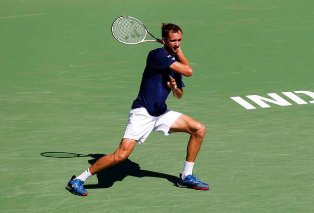 March 14, 2022 Daniil Medvedev of Russia returns a shot against Gael Monfils of France during the 2022 BNP Paribas Open at Indian Wells Tennis Garden in Indian Wells, California. Mandatory Photo Credit: CSM. Indian Wells United States of America - ZUMAc04_ 20220314_zaf_c04_027 Copyright: xCharlesxBausx