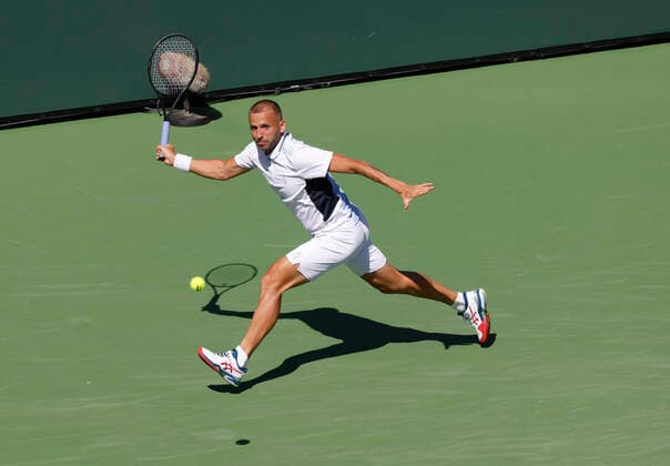 March 14, 2022 Daniel Evans of Britain returns a shot against Rafael Nadal of Spain during the 2022 BNP Paribas Open at Indian Wells Tennis Garden in Indian Wells, California. Mandatory Photo Credit: CSM. Indian Wells United States of America - ZUMAc04_ 20220314_zaf_c04_057 Copyright: xCharlesxBausx