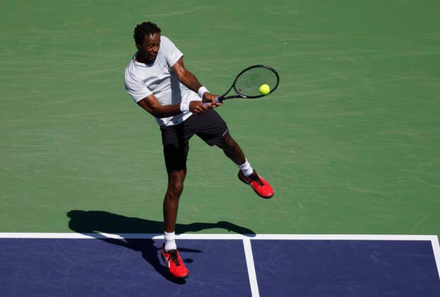 March 14, 2022 Gael Monfils of France returns a shot against Daniil Medvedev of Russia during the 2022 BNP Paribas Open at Indian Wells Tennis Garden in Indian Wells, California. Mandatory Photo Credit: CSM. Indian Wells United States of America - ZUMAc04_ 20220314_zaf_c04_071 Copyright: xCharlesxBausx