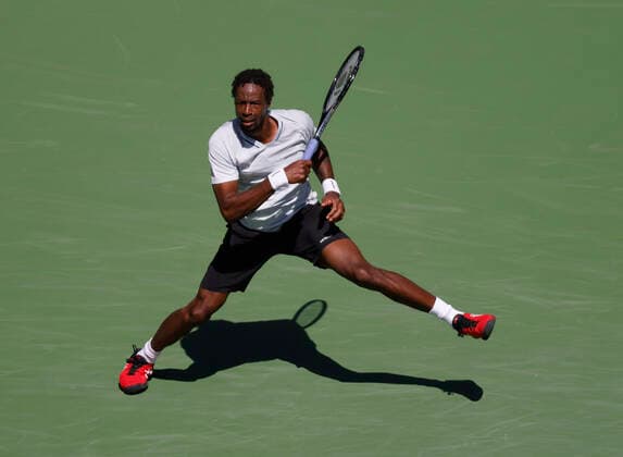 March 14, 2022 Gael Monfils of France returns a shot against Daniil Medvedev of Russia during the 2022 BNP Paribas Open at Indian Wells Tennis Garden in Indian Wells, California. Mandatory Photo Credit: CSM. Indian Wells United States of America - ZUMAc04_ 20220314_zaf_c04_088 Copyright: xCharlesxBausx