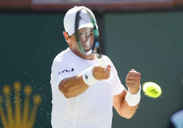 March 15, 2022 Jaume Munar of Spain returns a shot against Taylor Fritz during the 2022 BNP Paribas Open at Indian Wells Tennis Garden in Indian Wells, California. Mandatory Photo Credit: CSM. Indian Wells United States of America - ZUMAc04_ 20220315_zaf_c04_066 Copyright: xCharlesxBausx