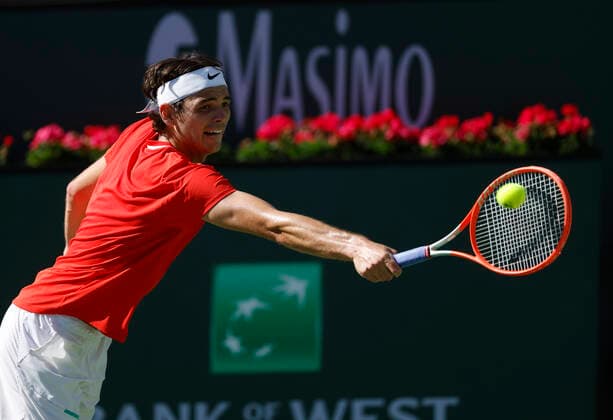 March 15, 2022 Taylor Fritz returns a shot against Jaume Munar of Spain during the 2022 BNP Paribas Open at Indian Wells Tennis Garden in Indian Wells, California. Mandatory Photo Credit: CSM. Indian Wells United States of America - ZUMAc04_ 20220315_zaf_c04_090 Copyright: xCharlesxBausx