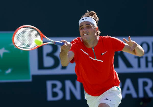 March 15, 2022 Taylor Fritz returns a shot against Jaume Munar of Spain during the 2022 BNP Paribas Open at Indian Wells Tennis Garden in Indian Wells, California. Mandatory Photo Credit: CSM. Indian Wells United States of America - ZUMAc04_ 20220315_zaf_c04_095 Copyright: xCharlesxBausx