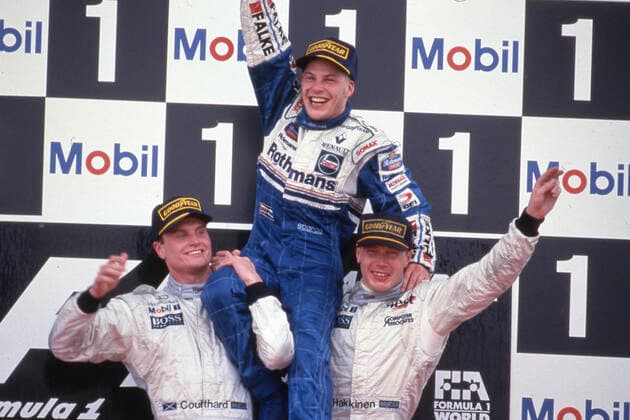 David Coulthard (GBR) McLaren 2nd position Mika Hakkinen (FIN) McLaren 1st position Jacques Villeneuve (CDN) Williams 3rd position celebrates on podium victory of Formula One World Championship, WM, Weltmeisterschaft Jerez de la Frontera Spain Copyright: xPhoto4xPhoto4x
