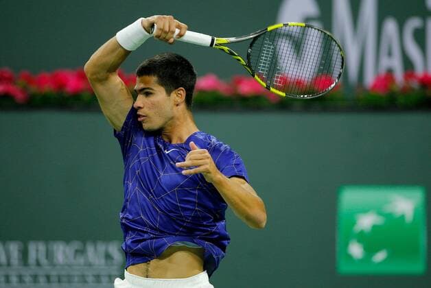 Mandatory Credit: Photo by Ella Ling Shutterstock (12845061ca) Carlos Alcaraz of Spain in action BNP Paribas Open, Tennis, Day 8, Indian Wells Tennis Garden, California, USA - 16 Mar 2022 BNP Paribas Open, Tennis, Day 8, Indian Wells Tennis Garden, California, USA - 16 Mar 2022 Copyright: xEllaxLing Shutterstockx 12845061ca