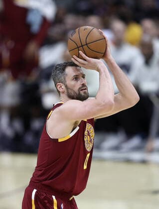 Cleveland Cavaliers Kevin Love (0) shoots a three against the Philadelphia 76ers at Rocket Mortgage Field House in Cleveland, Ohio on Wednesday, March 16, 2022.  CLE20220316120 AARONxJOSEFCZYK