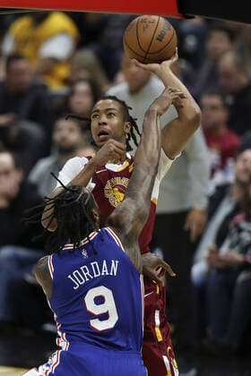 Cleveland Cavaliers Caris LeVert(3) shoots over Philadelphia 76ers .DeAndre Jordan(9) at Rocket Mortgage Field House in Cleveland, Ohio on Wednesday, March 16, 2022.  CLE20220316121 AARONxJOSEFCZYK