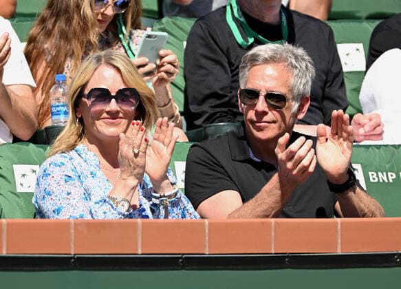 INDIAN WELLS, CA - MARCH 16: Actors Christine Taylor and her husband Ben Stiller applaud from the stands after Rafael Nadal of Spain won a point during a tennis match against Reilly Opelka of the United States played on March 16, 2022 at the BNP Paribas Open at the Indian Wells Tennis Garden in Indian Wells, CA. (Photo by John Cordes Icon Sportswire) TENNIS: MAR 16 BNP Paribas Open Icon506220316002