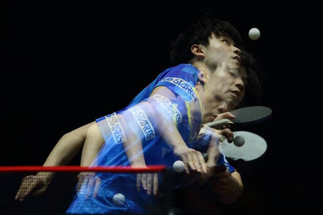 Sport Themen der Woche KW11 Singapore Smash 2022 (EDITORS NOTE: Multiple exposures were combined in camera to produce this image) Yukiya Uda of Japan plays a shot against Dang Qiu of Germany during their Men s Singles Quarterfinals match of Singapore Smash 2022 at OCBC Arena on March 17, 2022 in Singapore. Singapore Singapore  Copyright: xSuhaimixAbdullahx originalFilename:abdullah-notitle220317_npno0.jpg