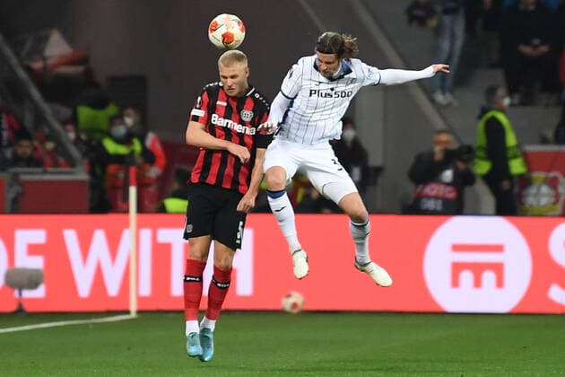 Leverkusen, Germany - 17 March 2022: Hans Hateboer vs Mitchel Bakker. The match of UEFA Europa League Bayer Leverkusen vs Atalanta Bergamo Copyright: xVITALIIxKLIUIEVx
