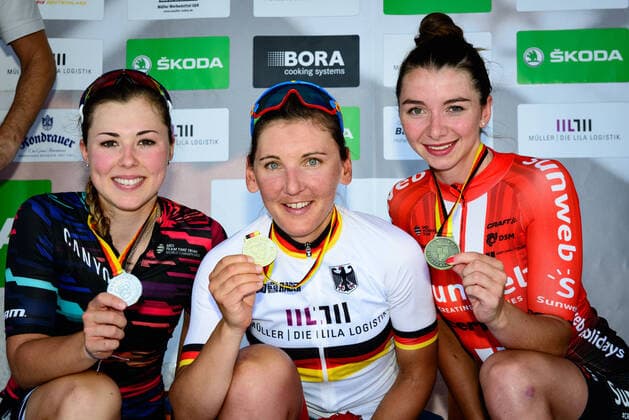 KLEIN Lisa, BRENNAUER Lisa, LIPPERT Liane: German Championships RR KLEIN Lisa ( GER ) - CANYON - SRAM RACING ( CSR ) - GER - Second Place - BRENNAUER Lisa ( GER ) WNT ROTOR PRO CYCLING TEAM ( WNT ) - GER LIPPERT Liane ( GER ) - TEAM SUNWEB ( SUN ) - NED - Third Place - Award Ceremony Medal Ceremony Podium - Querformat - quer - horizontal - Landscape - Event Veranstaltung: National Championships - German Championships - Category Kategorie: Cycling - Road cycling, Rad, Radsport, Strasse - Road Race ( RR ) - Elite Women - Location Ort: Europe Germany - Sachsen - Start & Finish: Hohenstein Ernstthal - Sachsenring - Discipline: Cycling - Road Cycling - Road Race ( RR ) - Distance: 102.5 km - Date Datum: 30.06.2019 Sunday -
