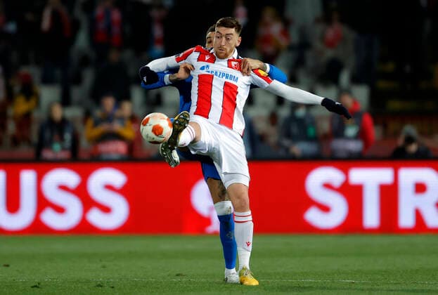 (220318) -- BELGRADE, March 18, 2022 -- Red Star Belgrade s Milan Pavkov (front) competes during the UEFA Europa League round of 16 second leg football match between Red Star Belgrade (Crvena Zvezda) and Glasgow Rangers in Belgrade, Serbia, March 17, 2022. (Photo by Xinhua) (SP)SERBIA-BELGRADE-UEFA-EUROPA LEAGUE-RED STAR VS RANGERS PredragxMilosavljevic 