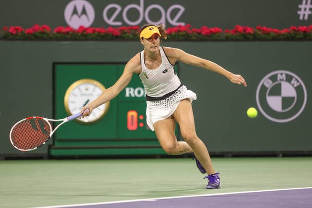 INDIAN WELLS, CA - MARCH 17: Alize Cornet (FRA) hits a forehand during the semifinal round of the BNP Paribas Open on March 17, 2022 at Indian Wells Tennis Garden in Indian Wells, CA. (Photo by George Walker Icon Sportswire) TENNIS: MAR 17 BNP Paribas Open Icon220317153