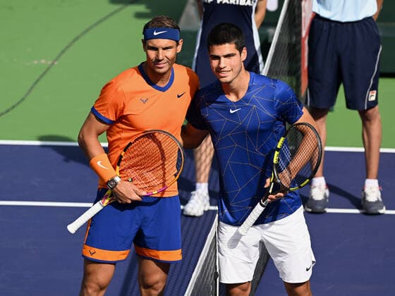 INDIAN WELLS, CA - MARCH 19: Rafael Nadal of Spain and Carlos Alcaraz of Spain pose for a photo before the start of a semifinals tennis match at the BNP Paribas Open played on March 19, 2022 at the Indian Wells Tennis Garden in Indian Wells, CA. (Photo by John Cordes Icon Sportswire) TENNIS: MAR 19 BNP Paribas Open Icon506220319050
