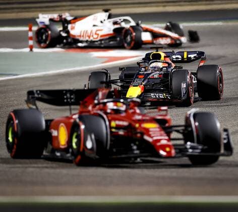 BAHRAIN - Max Verstappen (1) driving the Oracle Red Bull Racing RB18 Honda behind Charles Leclerc (16) with the Ferrari on track during the Bahrain F1 Grand Prix at the Bahrain International Circuit on March 20, 2022 in Bahrain, Bahrain. ANP ROBIN VAN LONKHUIJSEN Bahrain,BAHREIN xVIxANPx xxANPxIVx
