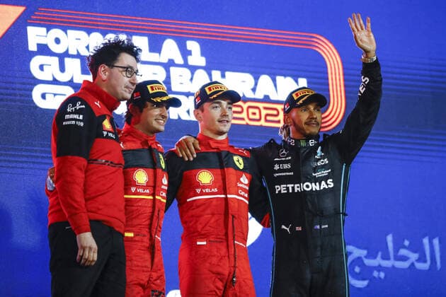 LECLERC Charles (mco), Scuderia Ferrari F1-75, portrait SAINZ Carlos (spa), Scuderia Ferrari F1-75, portrait BINOTTO Mattia (ita), Managing Director of the Scuderia Ferrari, portrait HAMILTON Lewis (gbr), Mercedes AMG F1 Team W13, portrait podium during the Formula 1 Gulf Air Bahrain Grand Prix 2022, 1st round of the 2022 FIA Formula One World Championship, WM, Weltmeisterschaft on the Bahrain International Circuit, from March 18 to 20, 2022 in Sakhir, Bahrain - F1 - BAHRAIN GRAND PRIX 2022 - RACE DPPI Panoramic 00122005__B3_9597